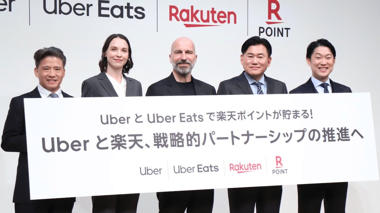 写真 人物 楽天ペイメント代表取締役社長・執行役員の小林重信氏(右端)、楽天グループ会長兼社長の三木谷浩史(右から2番目)をはじめ、Uberの関係者