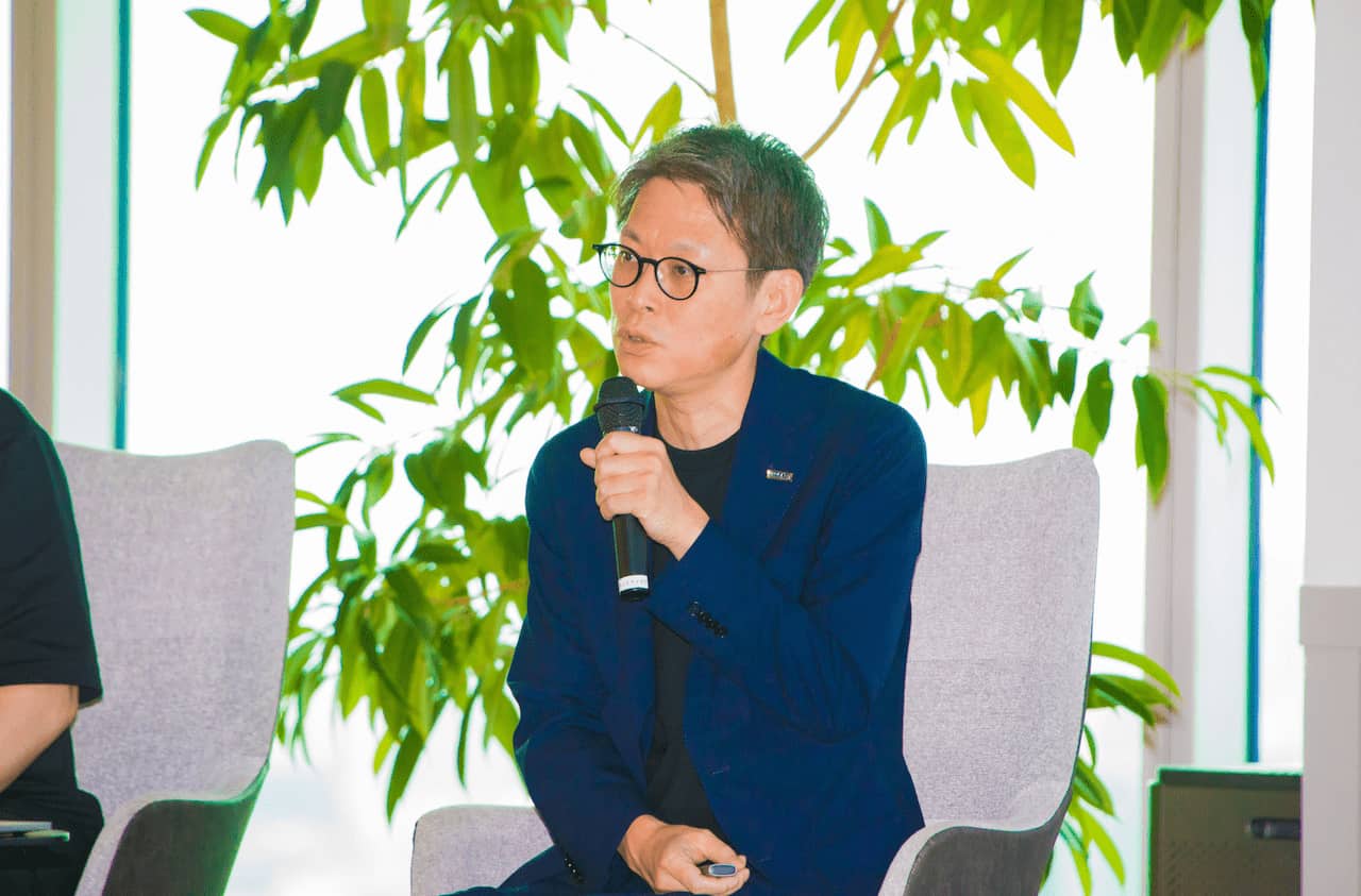 写真 人物 東レ コミュニケーション企画推進室長の半谷太二氏