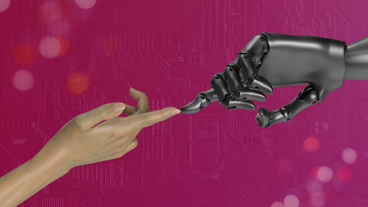 写真 ロボットと人の手
